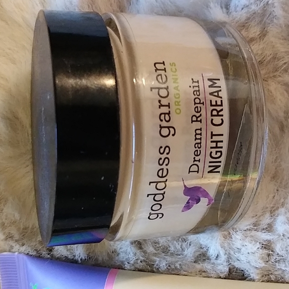 Gold Victoria's secret bag filled with a variety of beauty products. - Picture 10 of 13